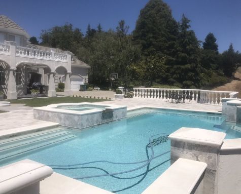 this image shows concrete brentwood pool deck