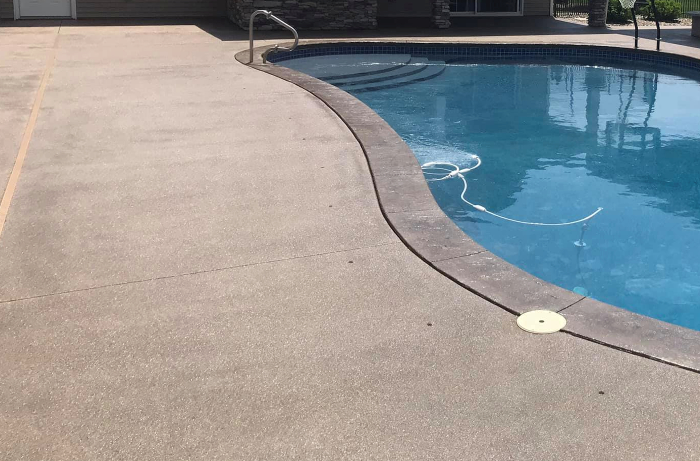 this image shows pool deck in Brentwood, California